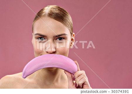 Smiling young female looking at camera 30374391