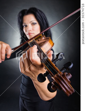 Musician playing violin 30374718