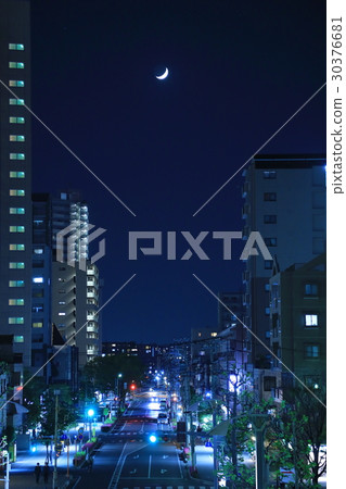 A city with crescent moon 30376681