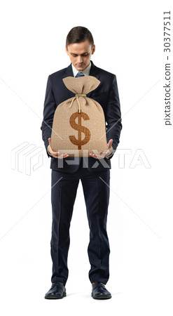 A businessman on white background holding a sack 30377511
