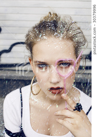 young pretty party girl smiling covered with 30379996