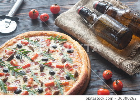 Cooked pizza with beer 30390262