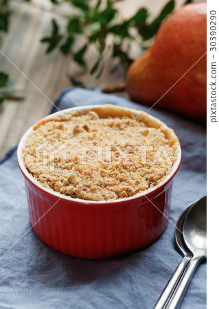 Close-up of a portion dessert pear crumble pie in 30390290