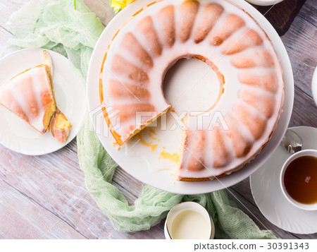 Bundt cake with frosting. Easter festive dessert Bundt cake with frosting. Easter festive dessert 30391343