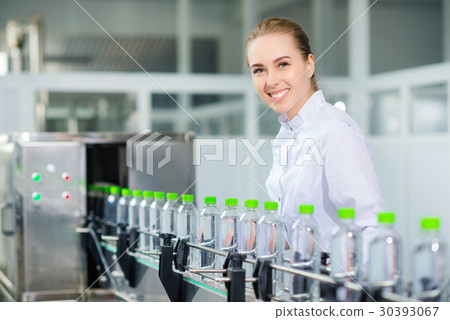 Specialist on a water factory 30393067