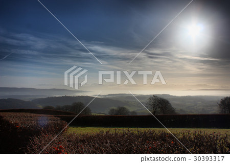 cloud or mist in a valley in exmoor national park cloud or mist in a valley in exmoor national park 30393317