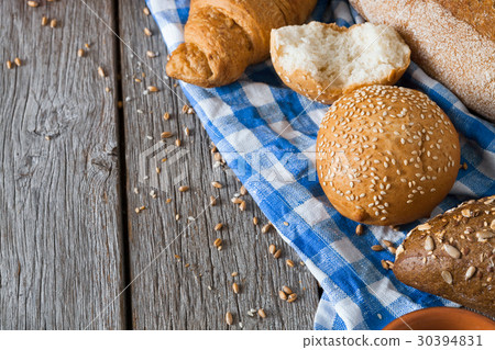 Bread background with copy space on rustic wood 30394831