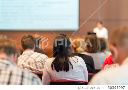 Speaker giving presentation on business conference 30395997