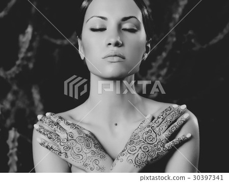 Lady with painted hands mehendi 30397341