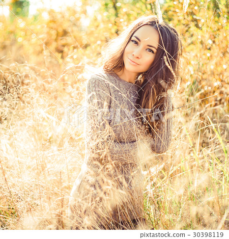 Beautiful lady in atmospheric landscape Beautiful lady in atmospheric landscape 30398119