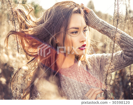 Fashion beautiful lady in autumn landscape Fashion beautiful lady in autumn landscape 30398120