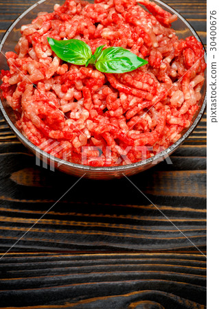 Minced meat of stuffing in glass bowl Minced meat of stuffing in glass bowl 30400676