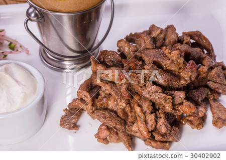 Beef Stroganoff from beef, stewed with sour cream Beef Stroganoff from beef, stewed with sour cream 30402902