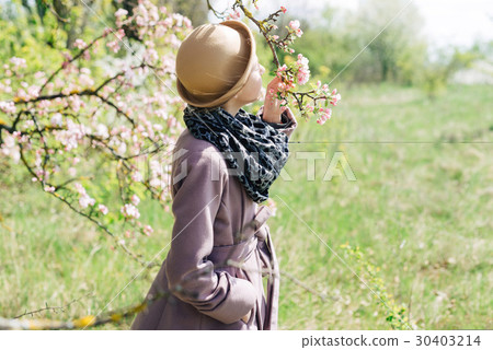 Portrait of a girl in a hat close-up of a spring 30403214