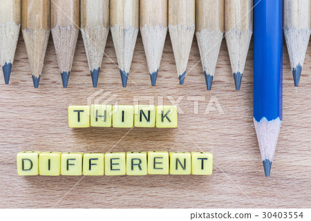 Words Think Different on wooden table with pencils Words Think Different on wooden table with pencils 30403554