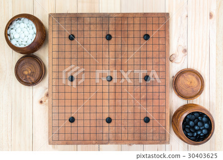 two wooden bowls with nine handicap stones  30403625