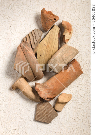 Pottery shards on light Pottery shards on light 30403858