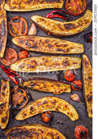 Roasted eggplants on baking tray top 30403989