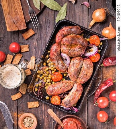 Rustic beef sausages on table 30404041