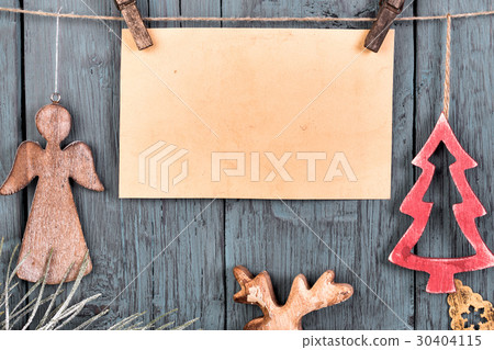 Vintage Christmas decorations hanging on string 30404115