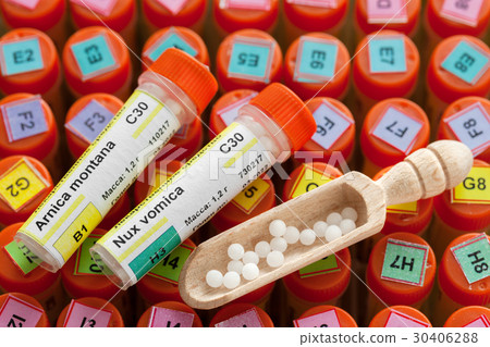 Tubes of homeopathy globules and scoop Tubes of homeopathy globules and scoop 30406288