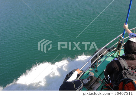 Passengers on the ferry boat near pier Passengers on the ferry boat near pier 30407511