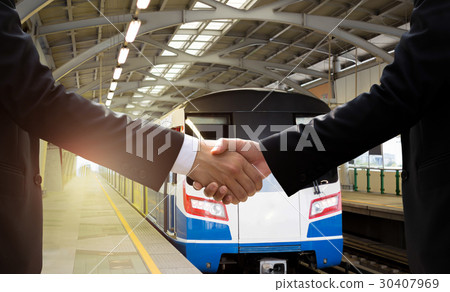 Businessman hand shake agreement with transport  Businessman hand shake agreement with transport  30407969
