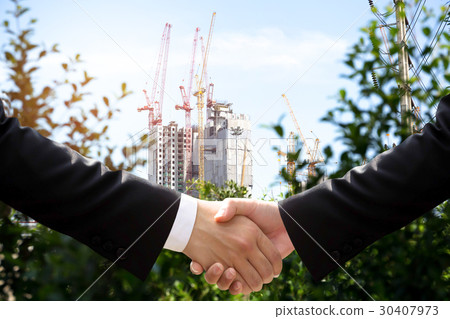 Environment Conceptual business hand shake  Environment Conceptual business hand shake  30407973