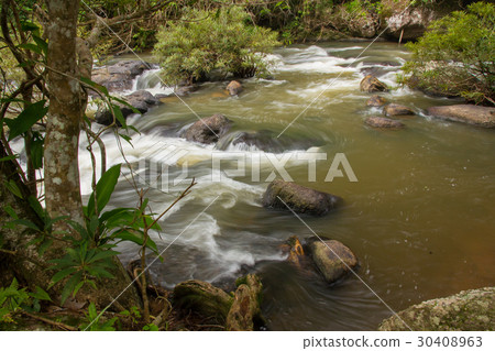 Beautiful waterfall in the deep forest Beautiful waterfall in the deep forest 30408963