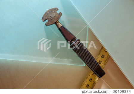 glass cutter, close up glass cutter, close up 30409874