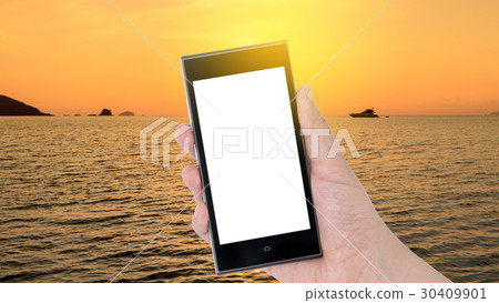 Hands holding smartphone with silhouette boat Hands holding smartphone with silhouette boat 30409901