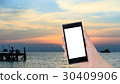Hands holding smartphone with Colorful sky 30409906