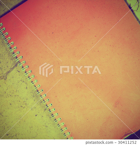 Old notebook on old wooden background 30411252