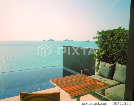 Cafe and swimming pool at a tropical beach 30411593