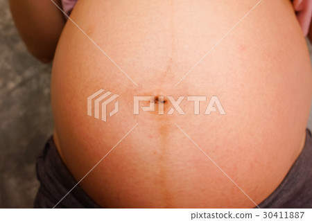 Close up of a cute pregnant belly 30411887