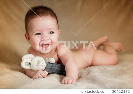 Portrait of newborn baby is lying on the blanket 30412382