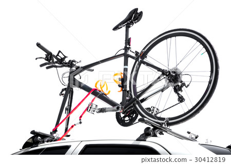 Bicycles on the top of car roof isolated 30412819