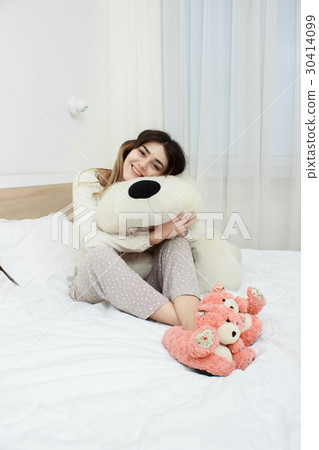 Young Beautiful girl at bed. Cheerful, happy, bed 30414099