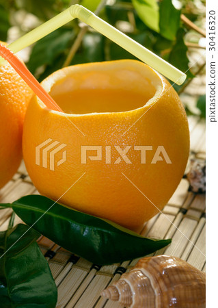 Citrus juice with straw in the orange fruit 30416320