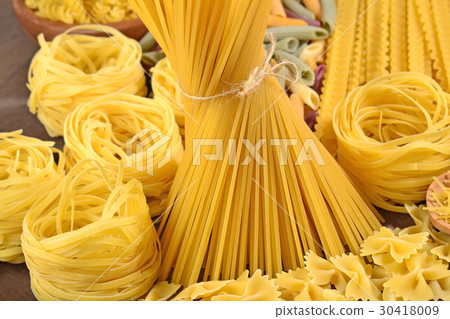 Assortment of uncooked Italian pasta 30418009