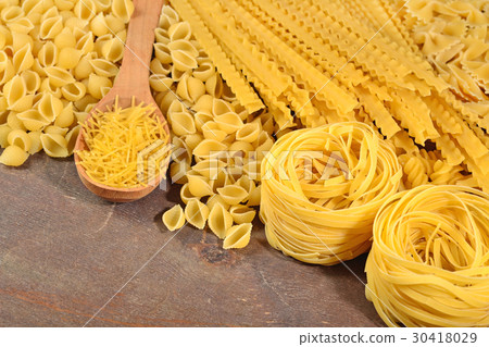 Assortment of uncooked Italian pasta 30418029