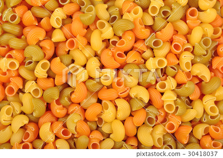 Colored uncooked italian pasta pipe rigate Colored uncooked italian pasta pipe rigate 30418037