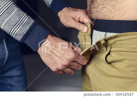 man undressing another man man undressing another man 30418587