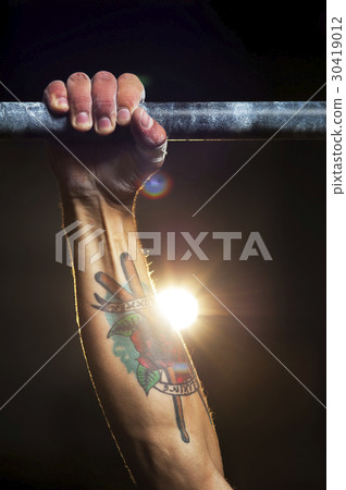 closeup of male hand with powder on horizontal bar closeup of male hand with powder on horizontal bar 30419012