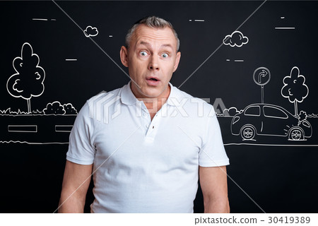 Baffled adult man witnessing car accident Baffled adult man witnessing car accident 30419389