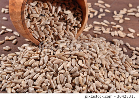 Cleared sunflower seeds in a bowl Cleared sunflower seeds in a bowl 30425313