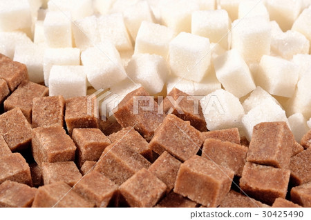 Heap of brown and white refined sugar 30425490