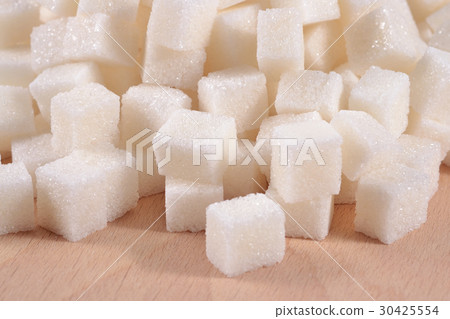 Heap of refined sugar 30425554