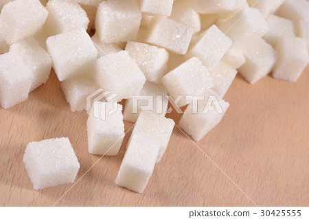 Heap of refined sugar 30425555
