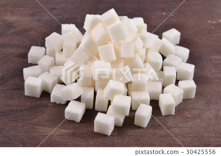 Heap of refined sugar 30425556